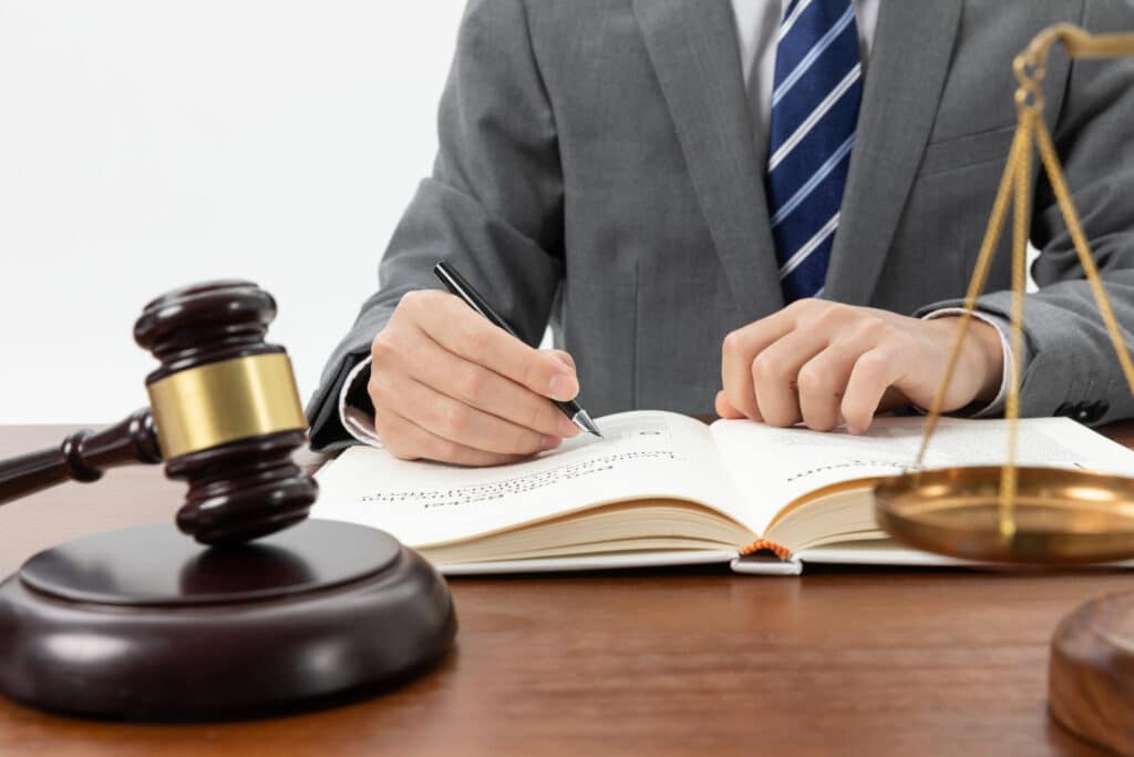 family lawyer write something on the book