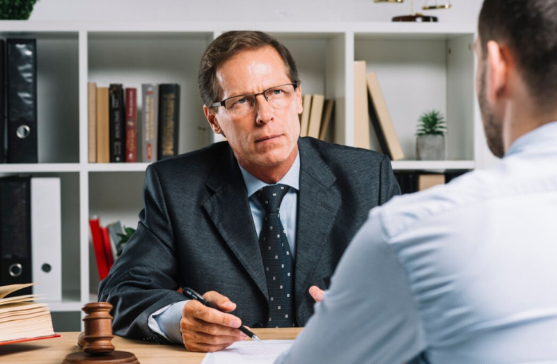 A lawyer is providing consultation to a client